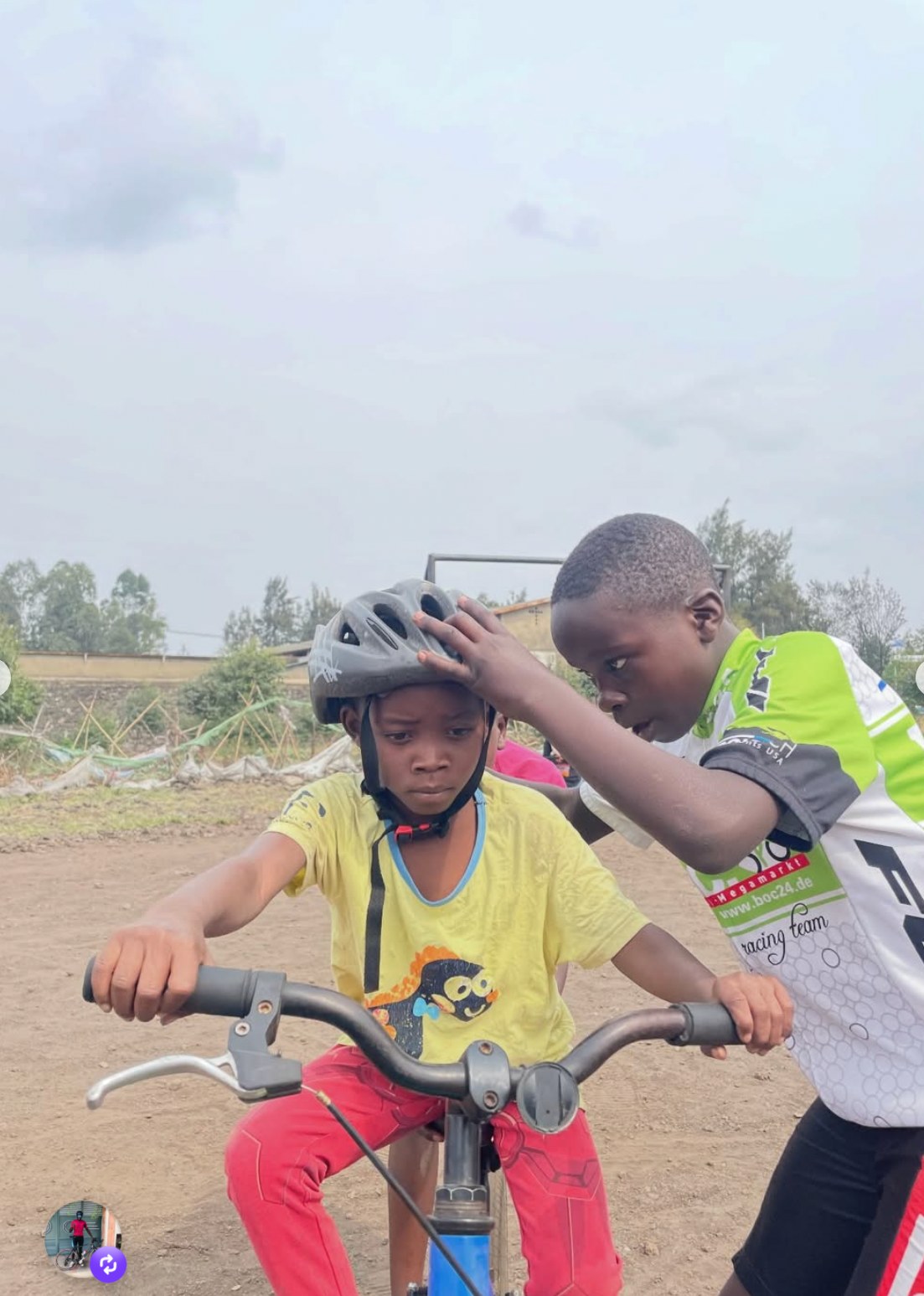 A young rider learning helmet safety